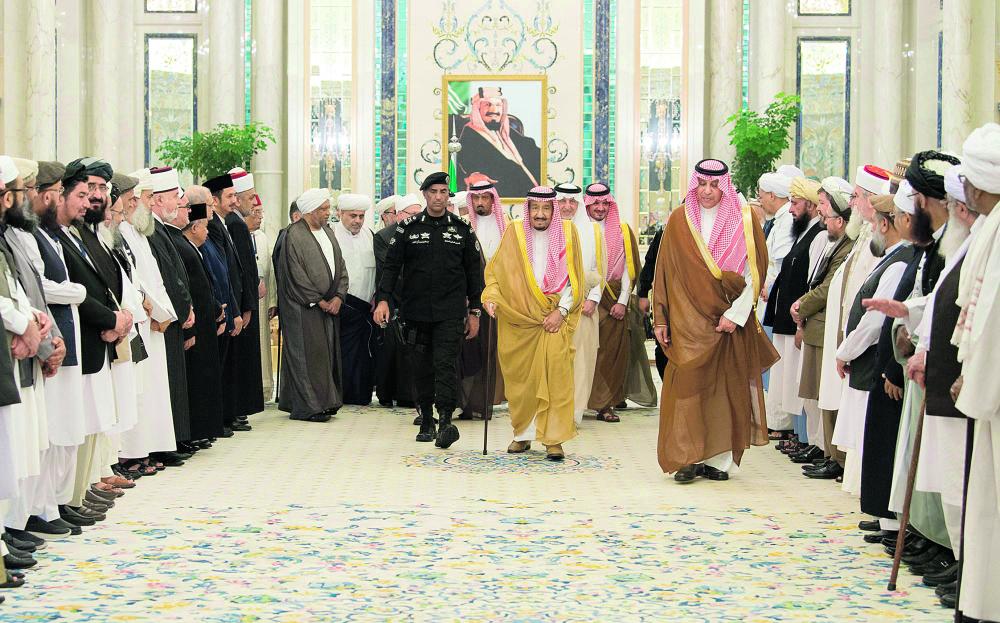 خادم الحرمين لوفد مؤتمر السلام: متفائلون بطي صفحة الماضي