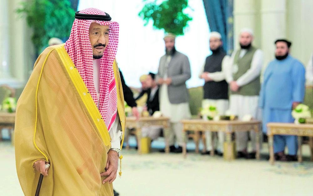 خادم الحرمين لوفد مؤتمر السلام: متفائلون بطي صفحة الماضي