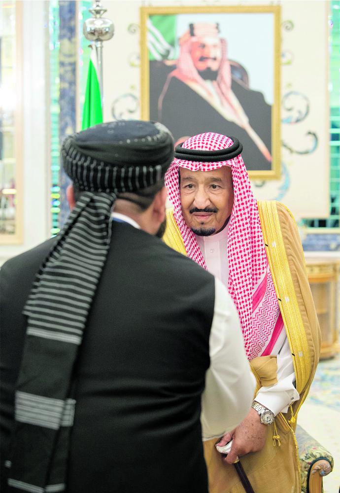 خادم الحرمين لوفد مؤتمر السلام: متفائلون بطي صفحة الماضي