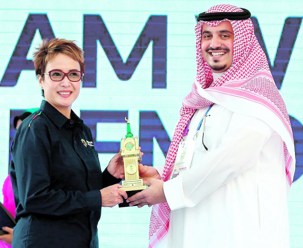 رفع علم المملكة في قرية الرياضيين بأسياد جاكرتا