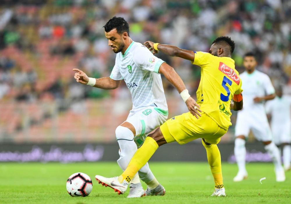 التعاون يحرج الأهلي بالتعادل