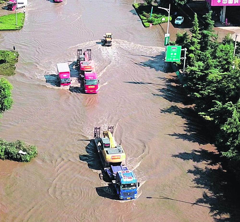 الأمطار تطرد 127 ألف صيني من منازلهم