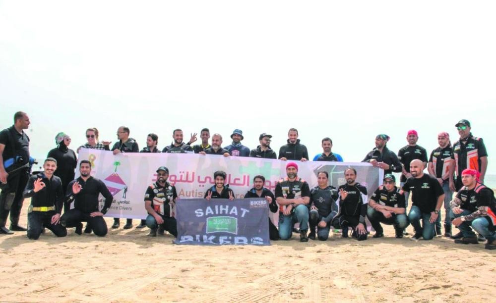 50 غواصا ودراجا يدعمون «أسر التوحد» معنويا في الشرقية