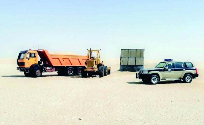 ضبط معدتين تجرفان الأراضي