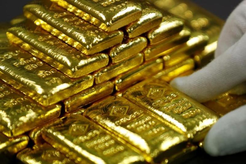 الذهب يتراجع 0.2 % مع تأثر الطلب على الملاذ الآمن 