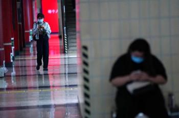 الصين تسجل 12 إصابة جديدة بكورونا