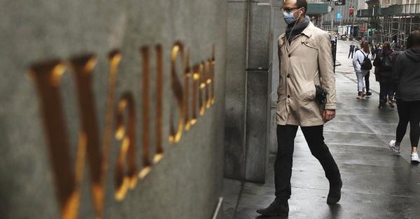 وول ستريت تبلغ مستوى قياسي مع استمرار ضخ السيولة