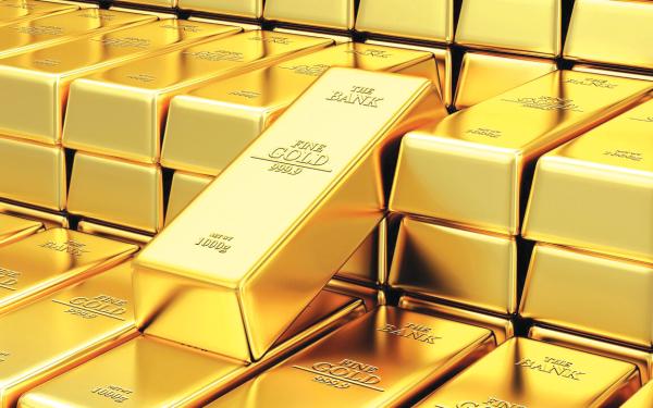 الذهب يتراجع ويتحرك في نطاق ضيق