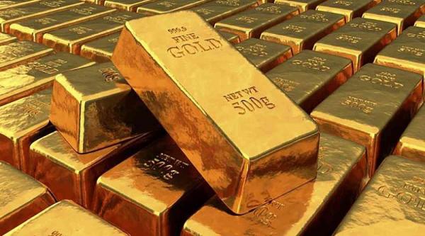 الذهب يتراجع عن أعلى مستوياته مع تماسك الدولار