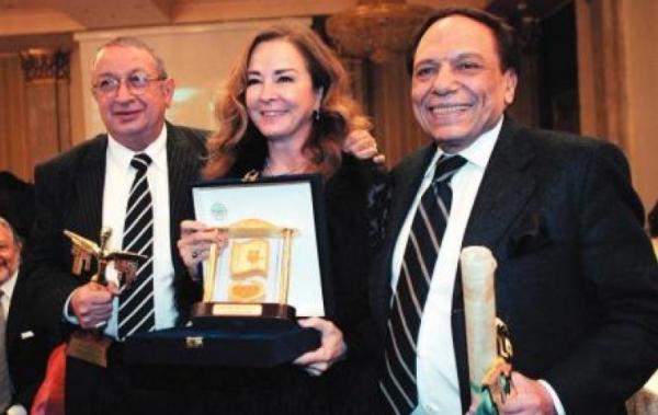 عادل إمام ونجلاء فتحي ونور الشريف خلال تكريمهم
