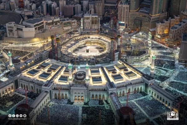 توزيع خرائط إرشادية لضيوف الرحمن