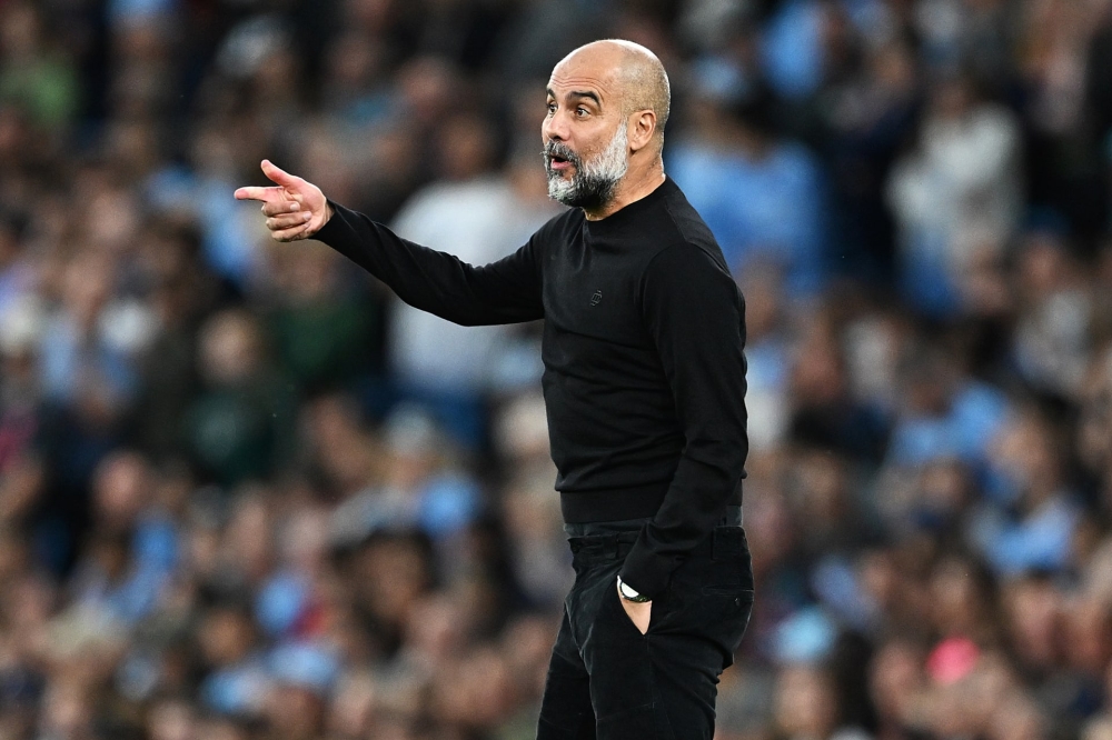 جوارديولا : الضغط يدفعنا إلى الأمام في الدوري الإنجليزي