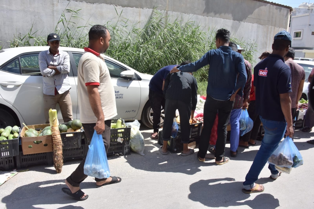سوق عشوائية للعمالة الوافدة في 