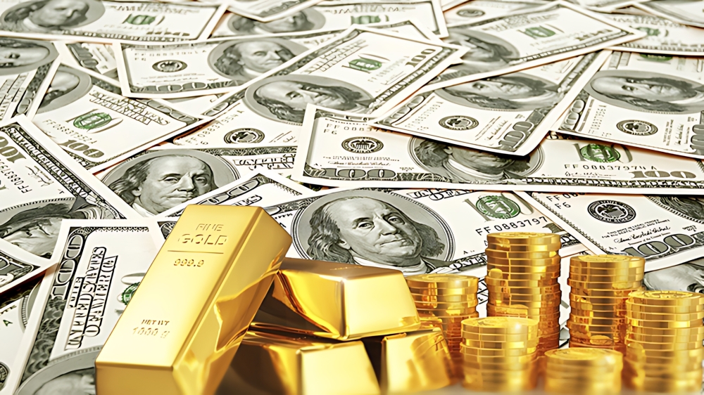 صعود الذهب وتراجع الدولار أبرز ردود الفعل على رفع الفائدة الأمريكية - (متداولة)