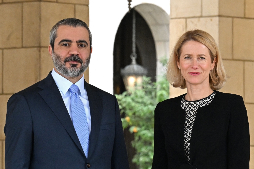 وزير الخارجية السوري والممثلة العليا للاتحاد الأوروبي - أ ف ب