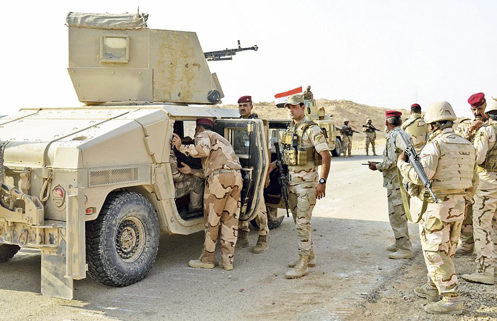 القوات العراقية أطلقت أمس معركة استرداد الحويجة من تنظيم داعش (أ.ف.ب)